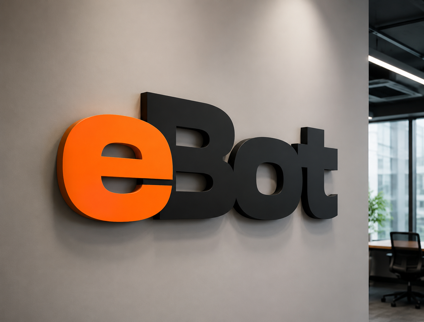 Объёмный логотип eBot на стене офиса компании